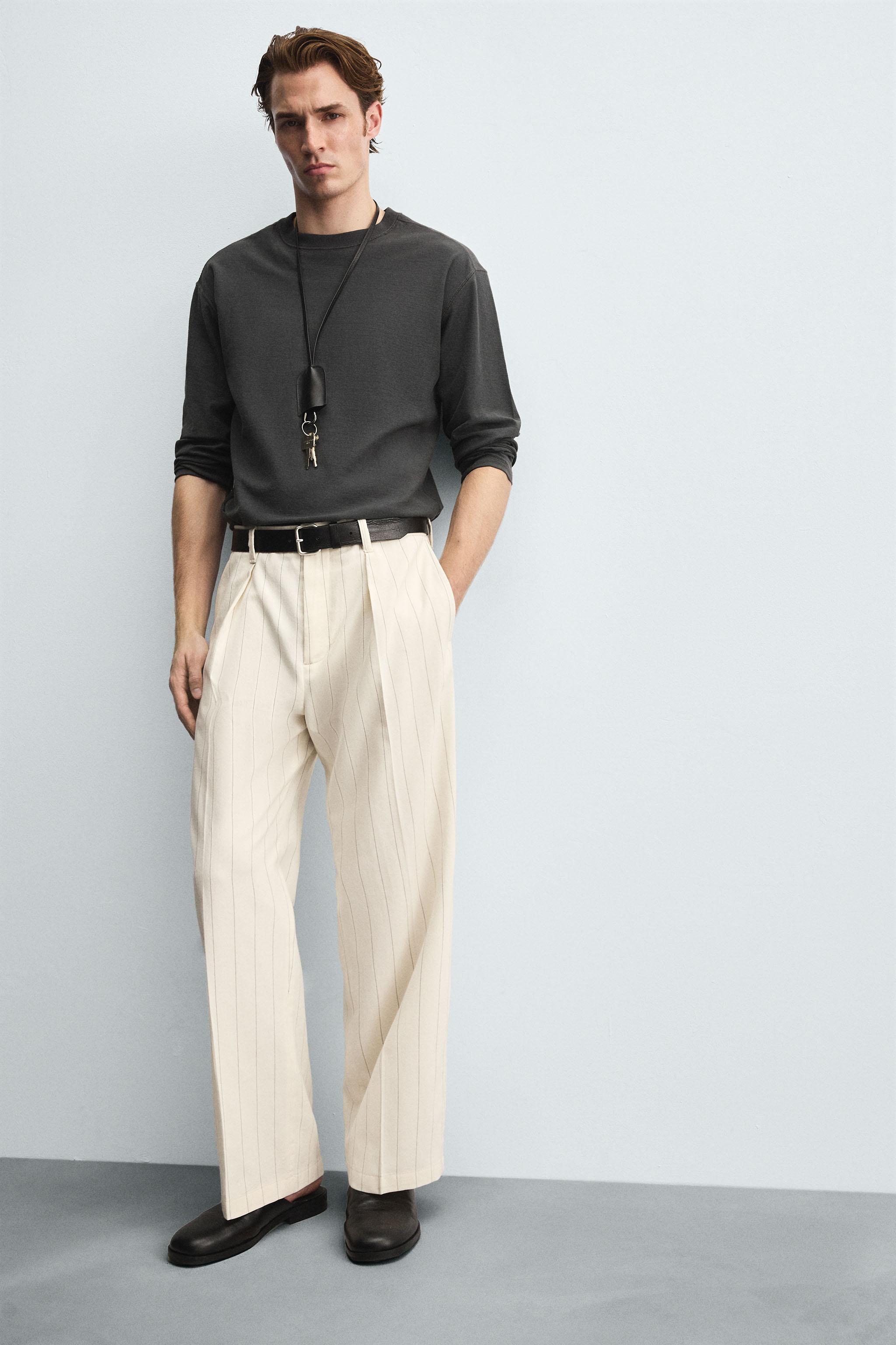 PLEATED STRIPE PANTS